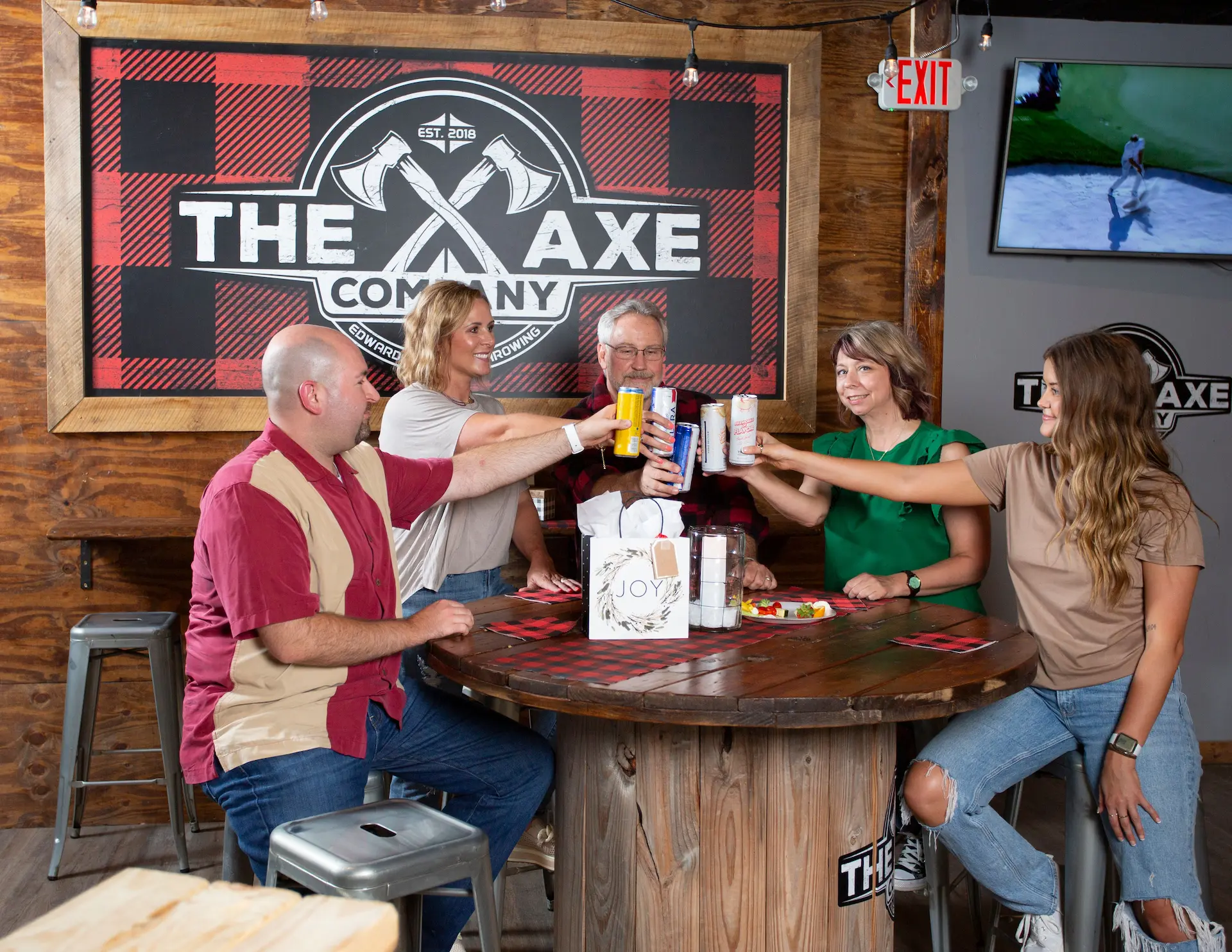 group of colleagues having a great time at the axe company